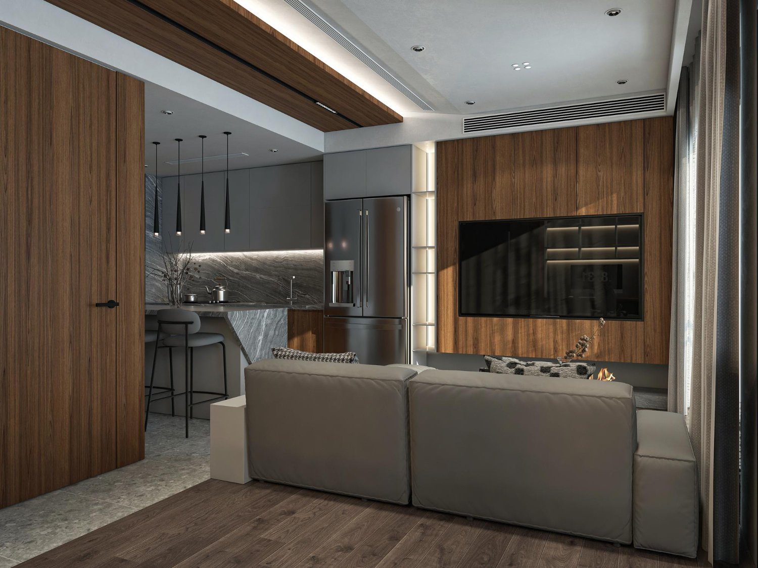 Sala de estar e cozinha planejada perfeitamente integradas, mostrando um design coeso e moderno.