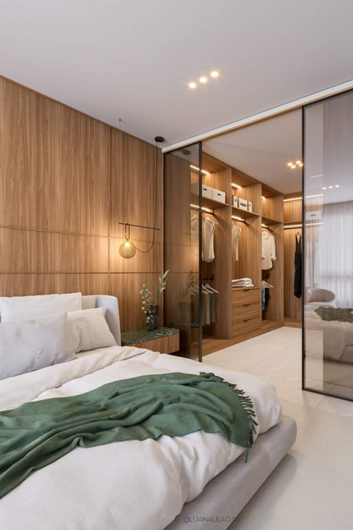Planta baixa para suíte master em conceito aberto integrada com closet e banheiro de luxo, destacando piso unificado e marcenaria sob medida.